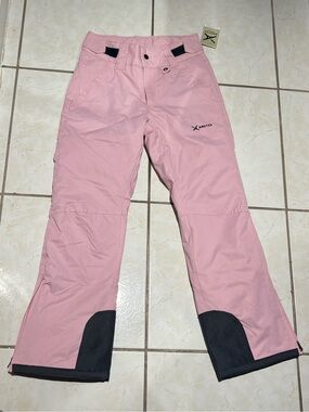 Arctix Pink woman’s Insulated Snow Pants with Black Reinforced Hems